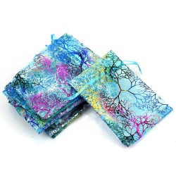 Organza bleu rose or : motifs arbres arabesques... et son petit cordonnet assorti
Matériaux utilisés: Organza

Très jolies po