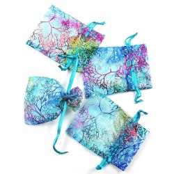 Organza bleu rose or : motifs arbres arabesques... et son petit cordonnet assorti
Matériaux utilisés: Organza

Très jolies po