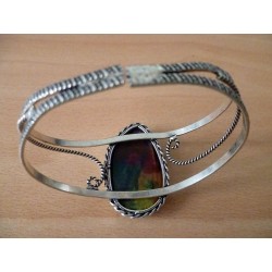 Bracelet en quartz solaire multicolore. 
Réglable.
Pierre 3,8 x 2,3 cm.
Hauteur de la monture 2,6cm.
Très belle pièce réalis