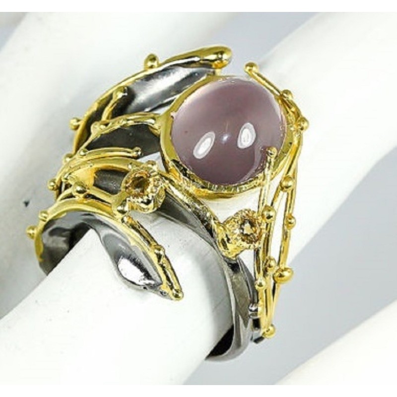 Pierre principale: Chalcedony cabochon rose  Naturelle
Traitement pierre principale: Non
Citrine
carats (TCW): 50.05
Argent 