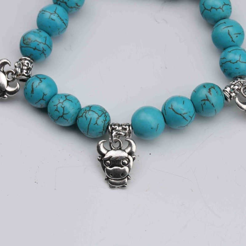Très joli bracelet perles de turquoises naturelles signe astrologique : Bovin  argent tibétain, fait à la main, à l'ancienne.