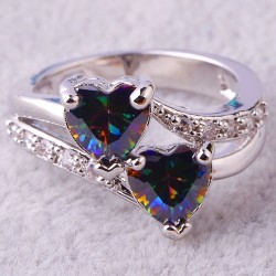 Argent 925 .Topaze mystique  : 2.Taille : forme de cœur.Argent massif 925. Poinçonné dans l'anneau.Taille 57 (8). Poids : 3.08 g